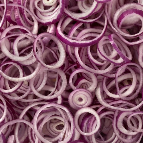 Fresh raw red onion rings
